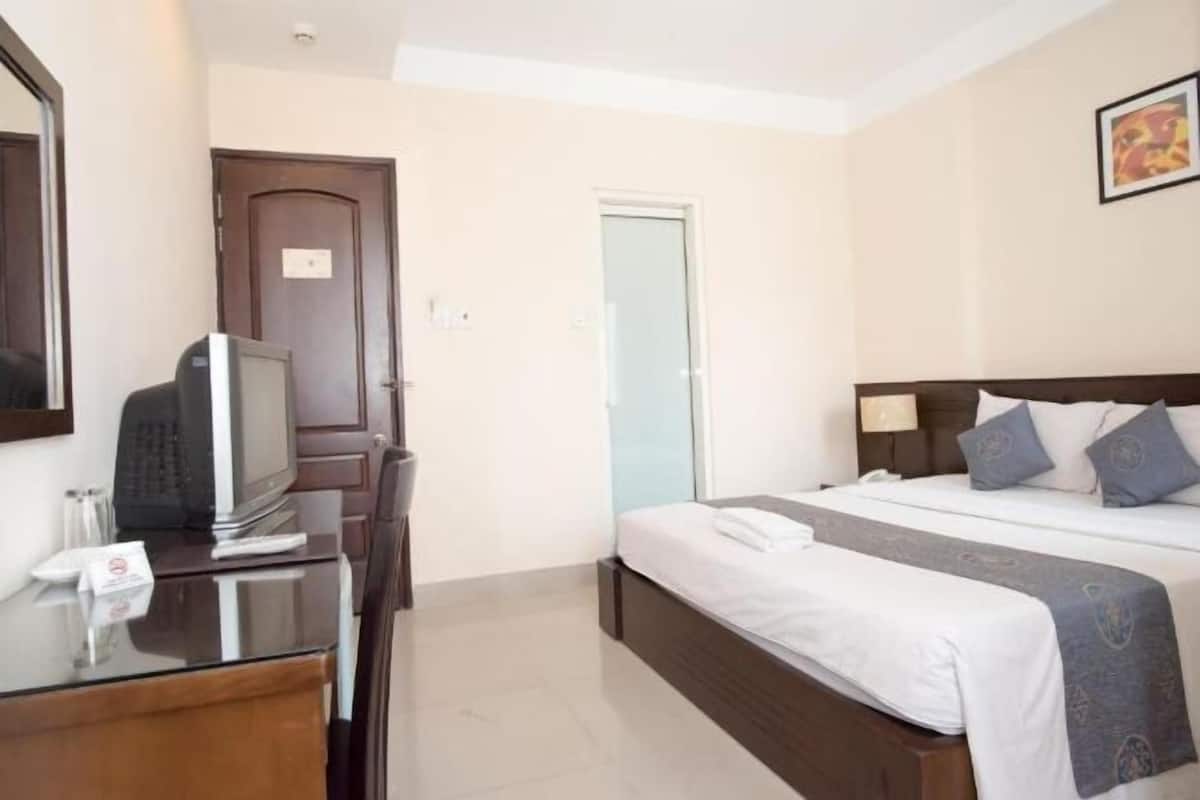 Premium bedding, desk, laptop workspace, soundproofing
