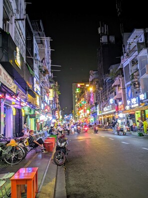 A busy street at night with illuminated signs and buildings. - 99 Bui Vien Hotel (Ho Chi Minh City)