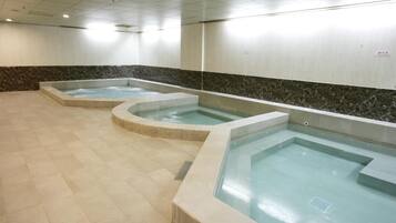 Relax in one of three unique hot tubs, surrounded by a clean and elegant space.