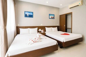 Family Room | Desk, blackout curtains, soundproofing, free WiFi