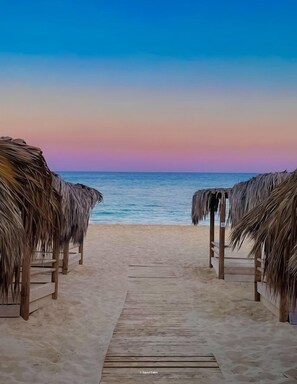 Private beach, sun-loungers, beach umbrellas, beach volleyball - Dome Beach Marina Hotel & Resort (Ayia Napa)
