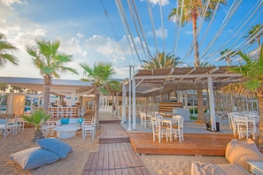 Private beach, sun loungers, beach umbrellas, beach volleyball