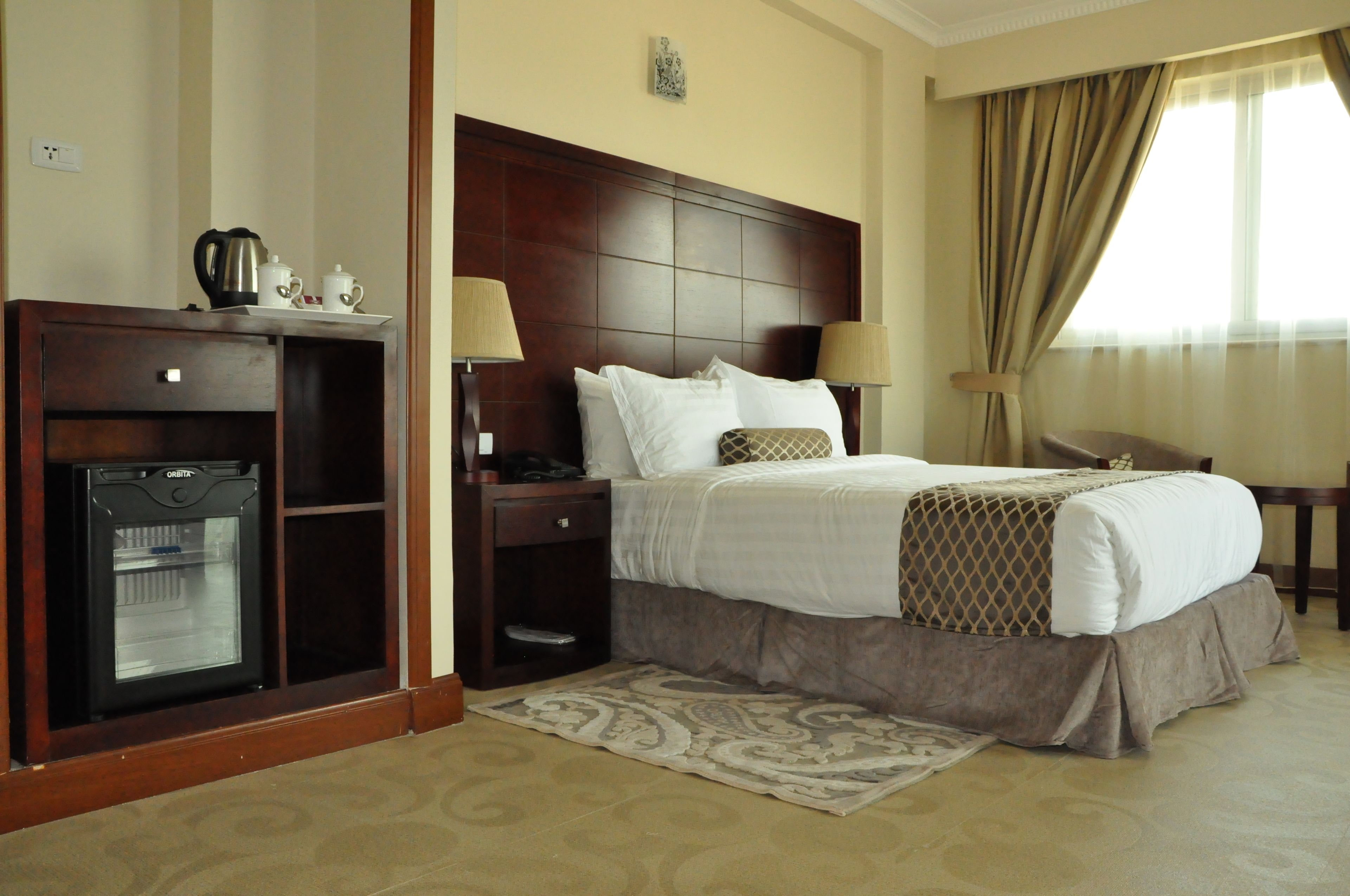 deluxe room, 1 king bed, balcony, mountain view | frette italian sheets, down duvets, pillow-top beds, minibar