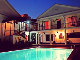 Outdoor pool, pool umbrellas, sun loungers