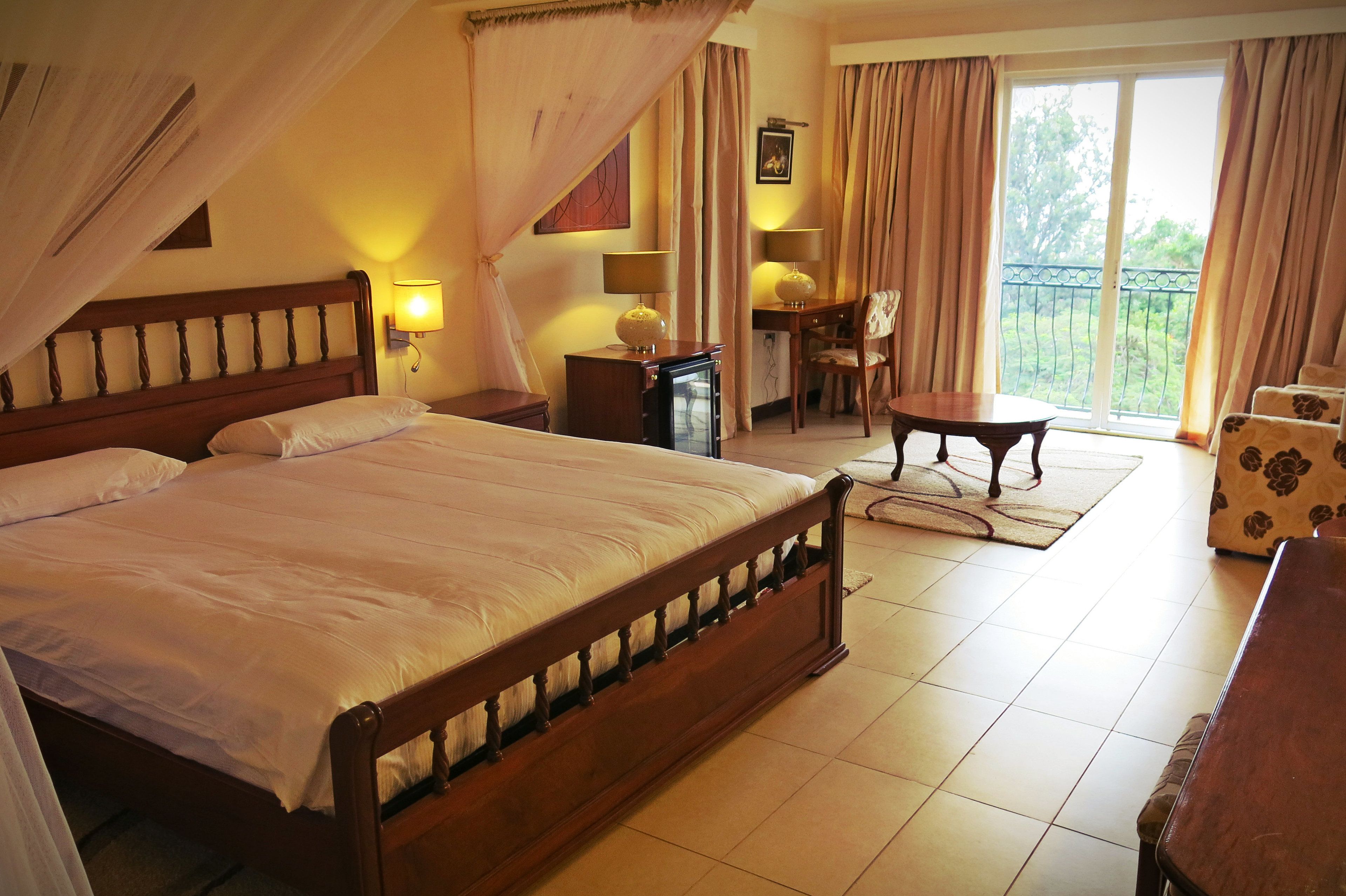 deluxe double room, 1 king bed, lake view | 1 bedroom, premium bedding, minibar, in-room safe
