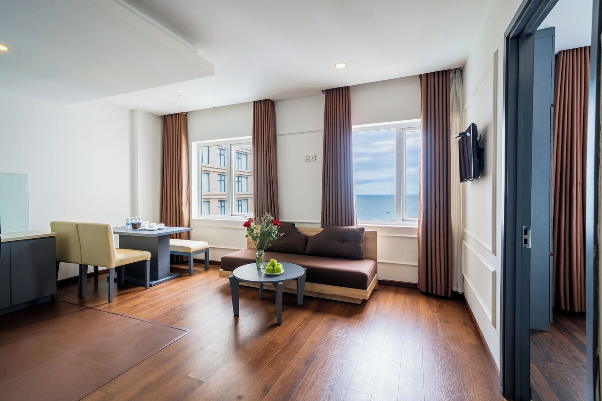 Family Room, Sea View | Living area | 32-inch LED TV with digital channels, TV, fireplace