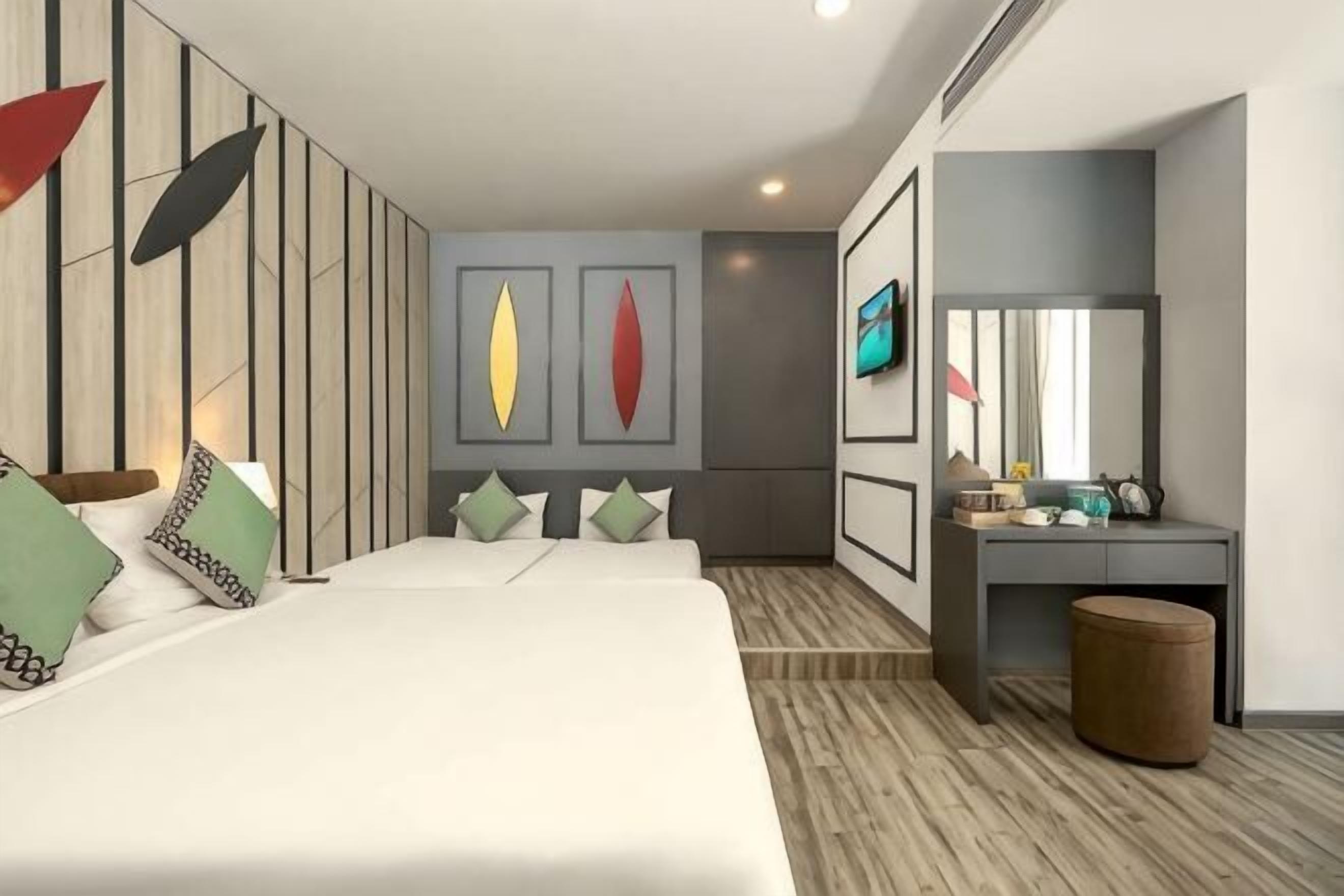 Roba de llit d'alta qualitat, cobrellits i minibar 