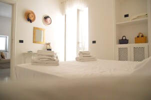 City Penthouse, Multiple Beds, Kitchenette | Iron/ironing board, cribs/infant beds, free WiFi, bed sheets