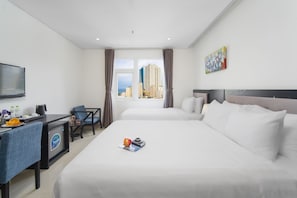 Premium bedding, pillow-top beds, minibar, in-room safe