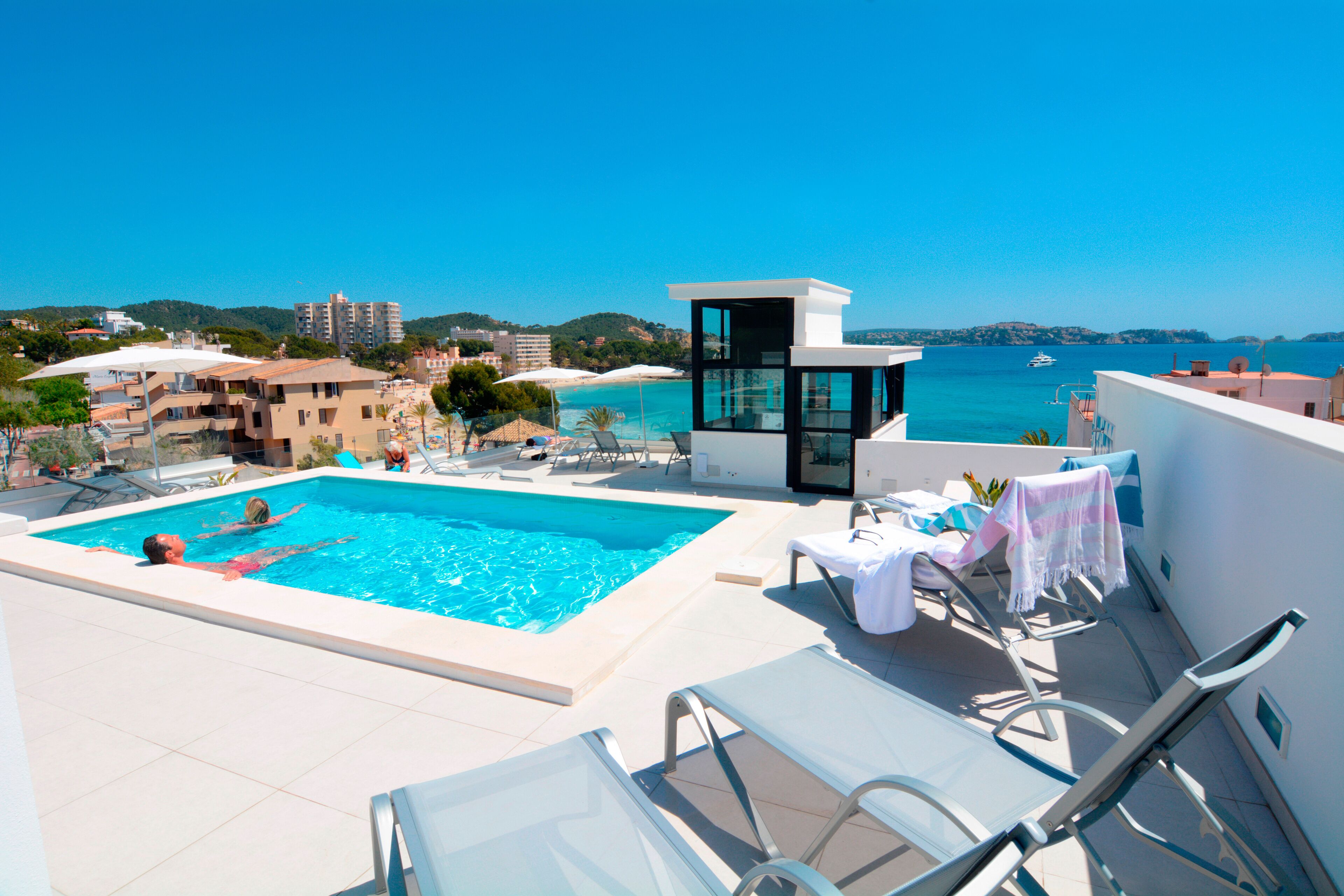 seasonal outdoor pool, open 9:00 am to 9:00 pm, pool umbrellas