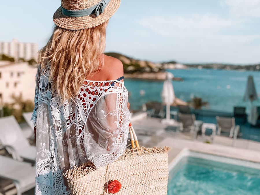 Seasonal outdoor pool, open 9:00 AM to 9:00 PM, pool umbrellas