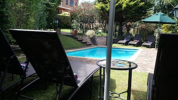 Outdoor pool, pool umbrellas, pool loungers