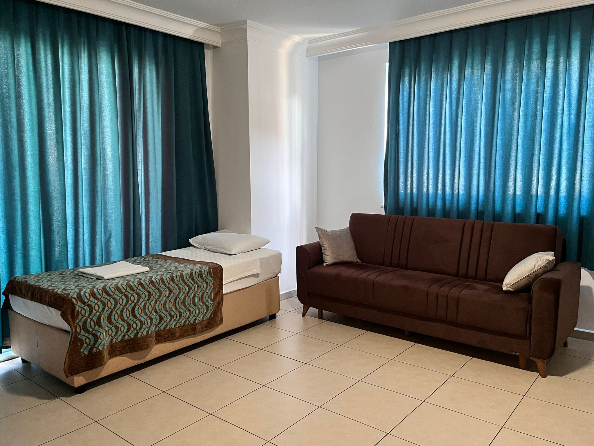 family apartment | living area | 55-inch lcd tv with satellite channels, tv