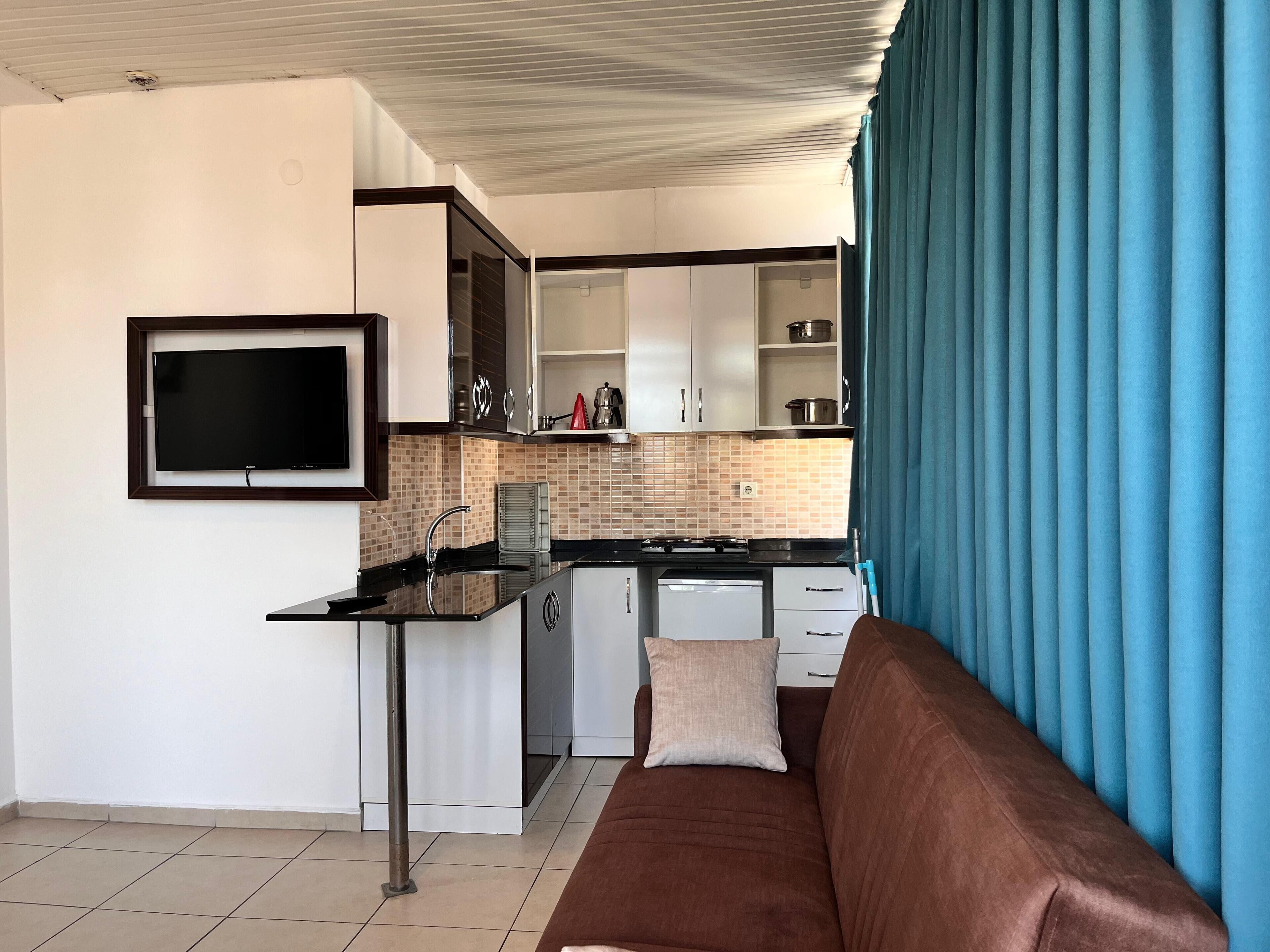 family room loft (3 single beds or 1 double bed and 1 single bed) | private kitchen | mini-fridge, high chair