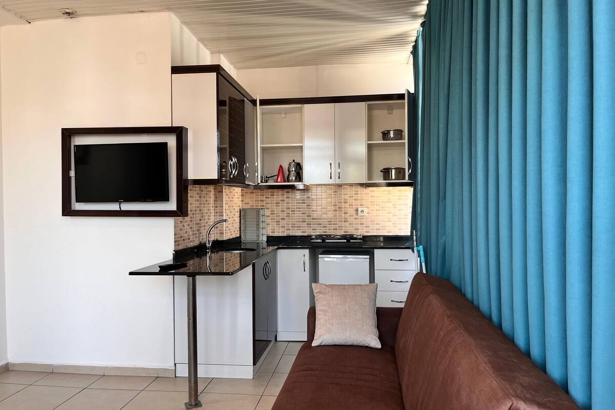 family room loft (3 single beds or 1 double bed and 1 single bed) | private kitchen | mini-fridge, high chair