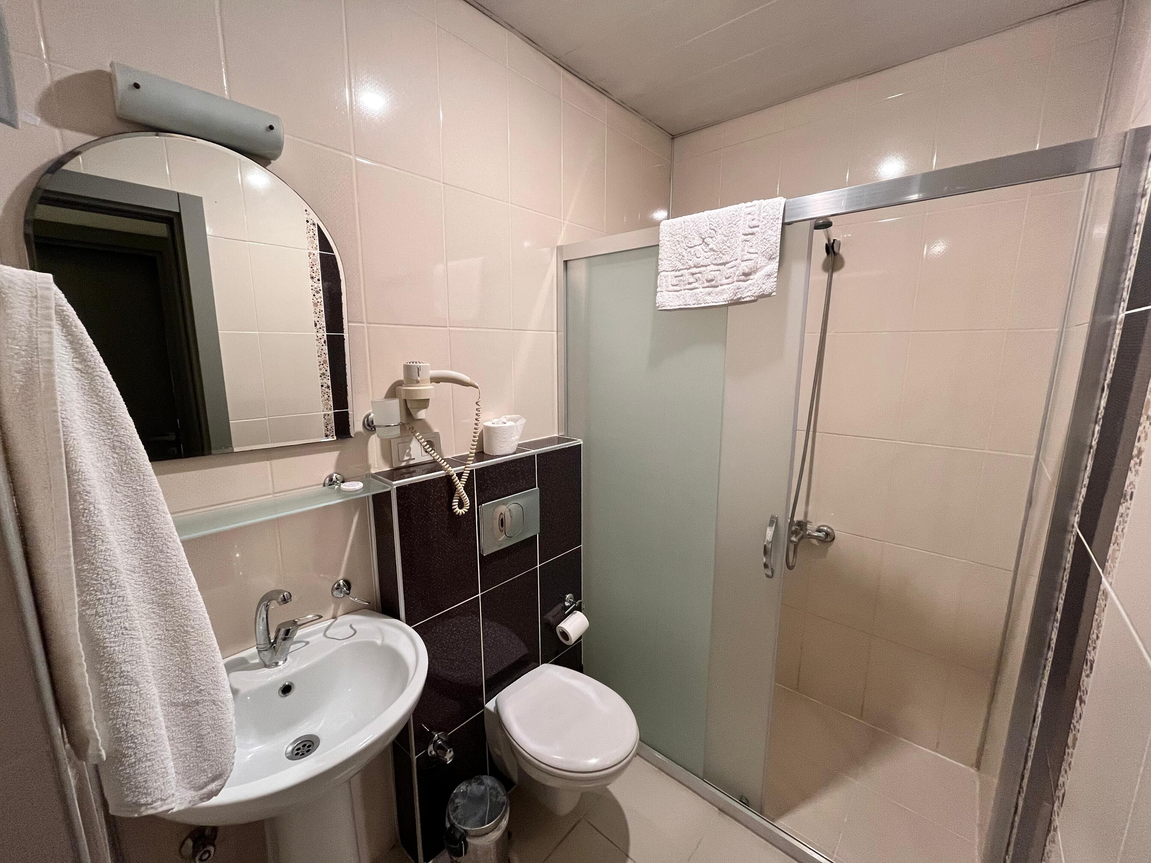 family room loft (3 single beds or 1 double bed and 1 single bed) | bathroom | shower, hair dryer, slippers, towels