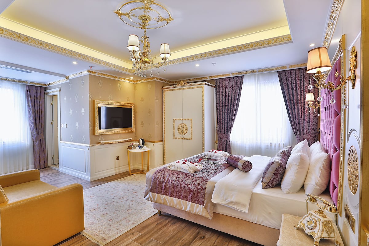 Habitación triple Deluxe | 1 habitación, sábanas de algodón egipcio y ropa de cama de alta calidad