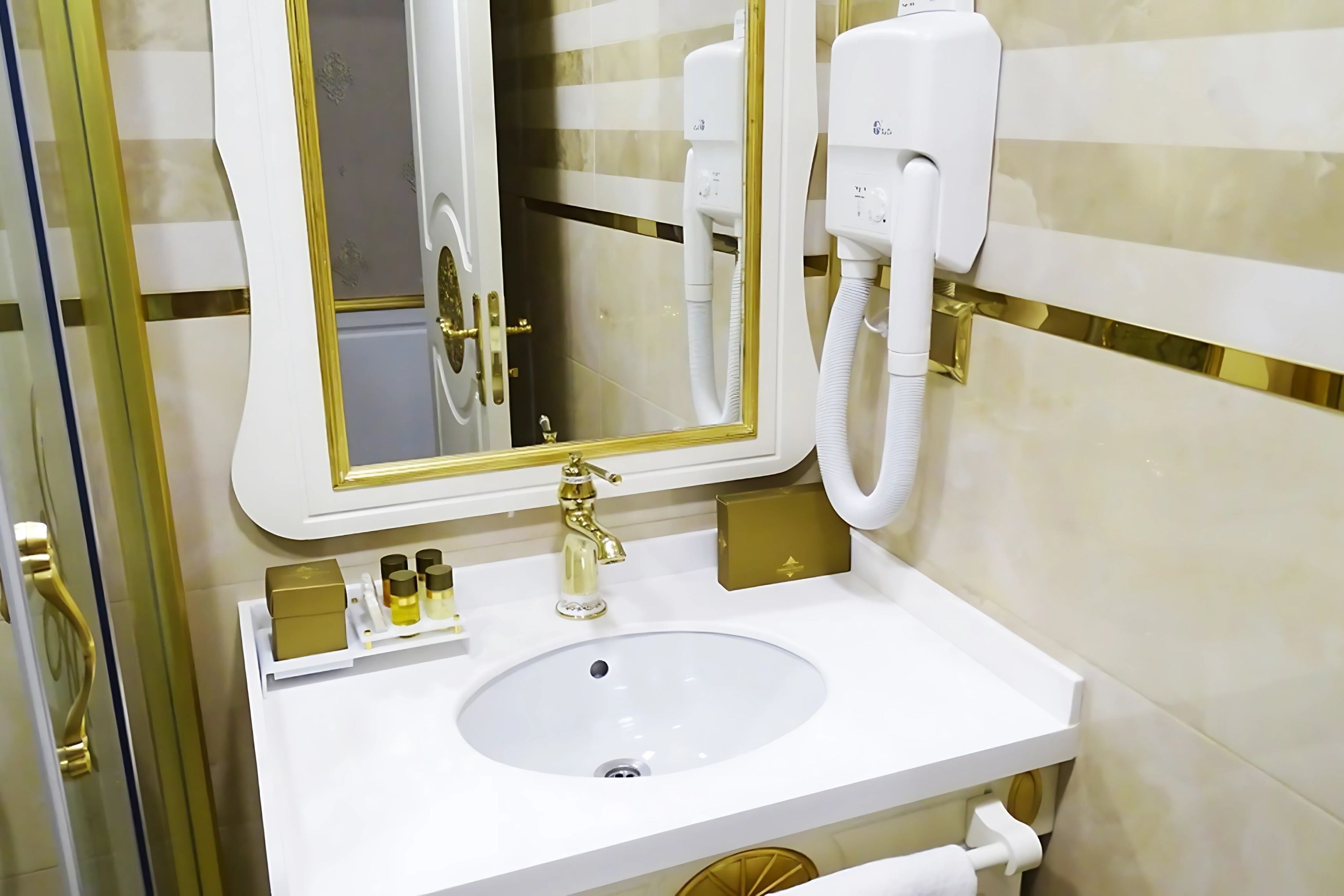 family room | bathroom | shower, designer toiletries, hair dryer, bathrobes