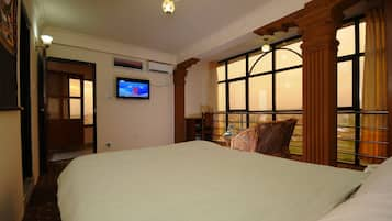 Deluxe Room, 1 King Bed, Smoking, Mountain View | Premium bedding, desk, iron/ironing board, free WiFi