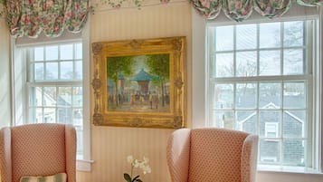 Deluxe Room, 1 King Bed | Living area | 19-inch flat-screen TV with cable channels, TV, DVD player