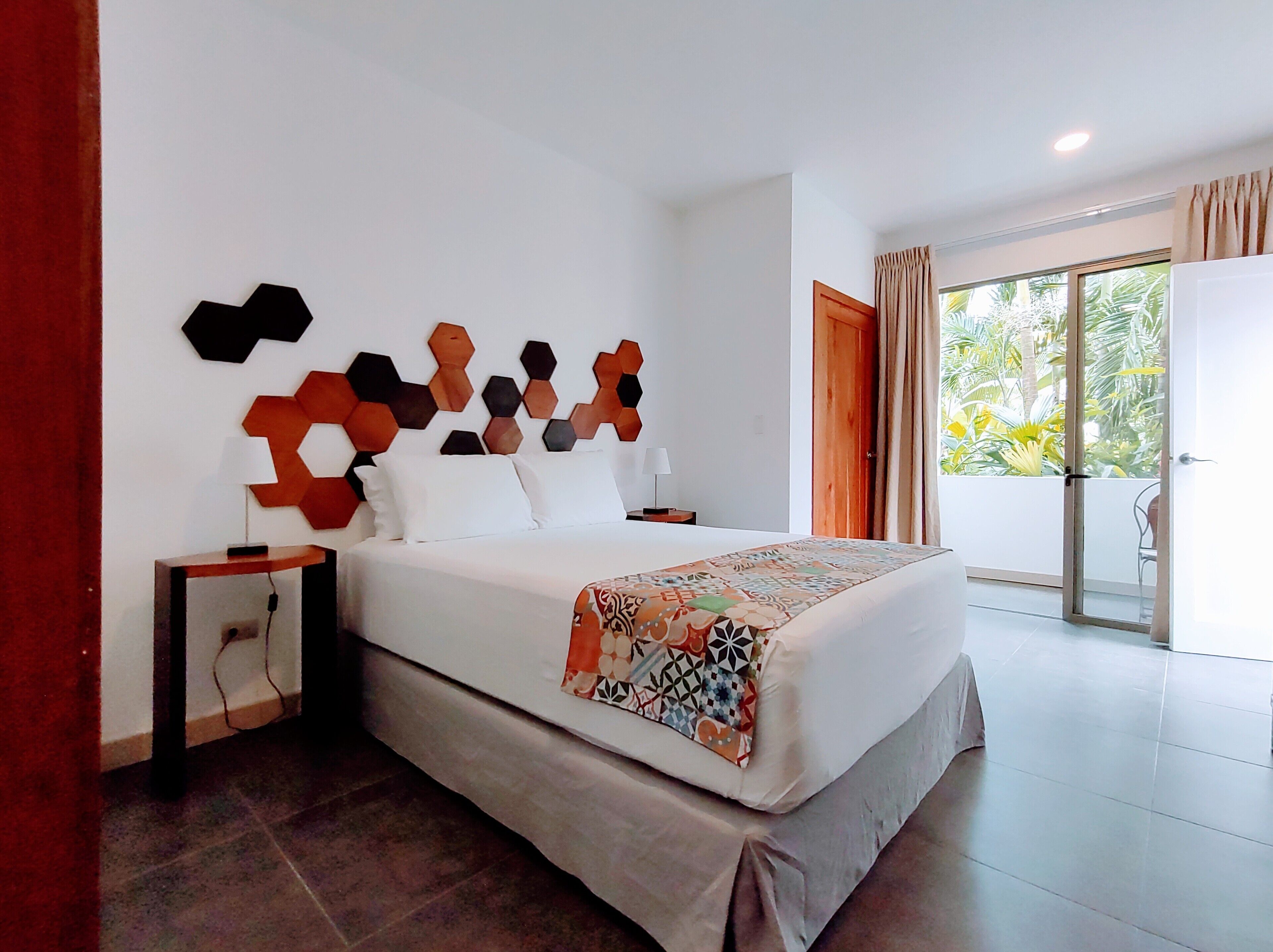 family room | 1 bedroom, premium bedding, minibar, in-room safe