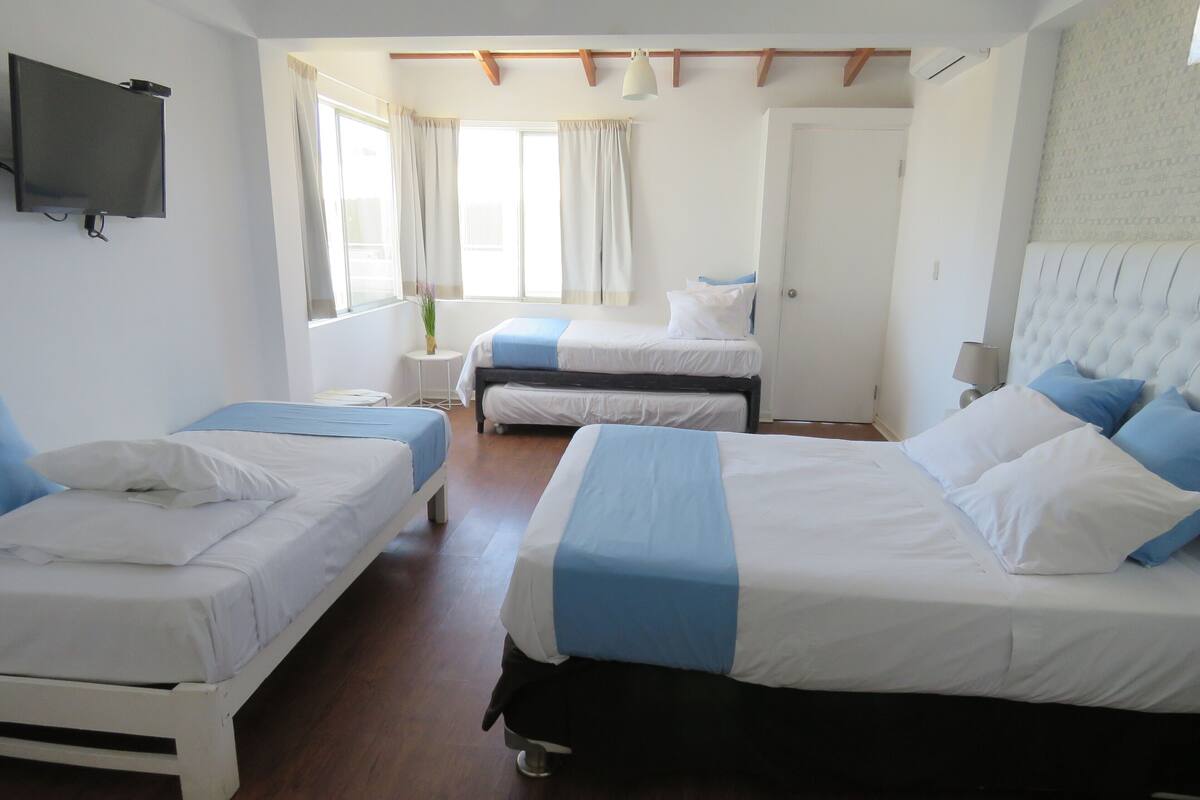 Suite Junior Familiar | Ropa de cama de alta calidad y minibar