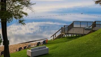 On the beach, sun loungers, kayaking, rowing
