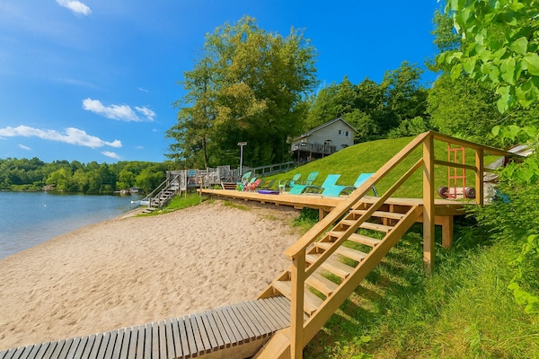 On the beach, sun loungers, kayaking, rowing