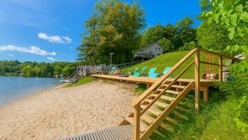 On the beach, sun loungers, kayaking, rowing