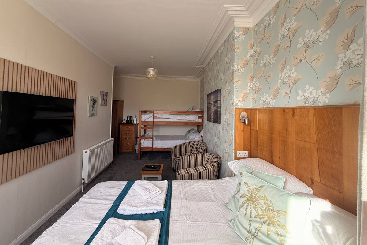 Family Room | Laptop workspace, iron/ironing board, individually decorated