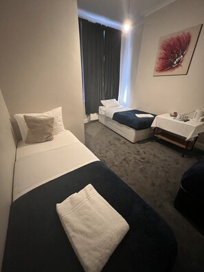 Triple Room, Private Bathroom | Iron/ironing board, free WiFi - Goodwood Hotel (London)