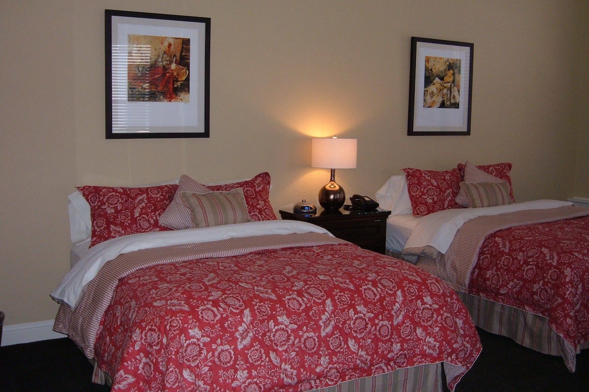 Standard Room, 2 Queen Beds | Desk, iron/ironing board, rollaway beds, free WiFi