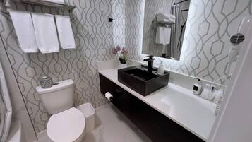 Shower, rainfall showerhead, eco-friendly toiletries, hair dryer