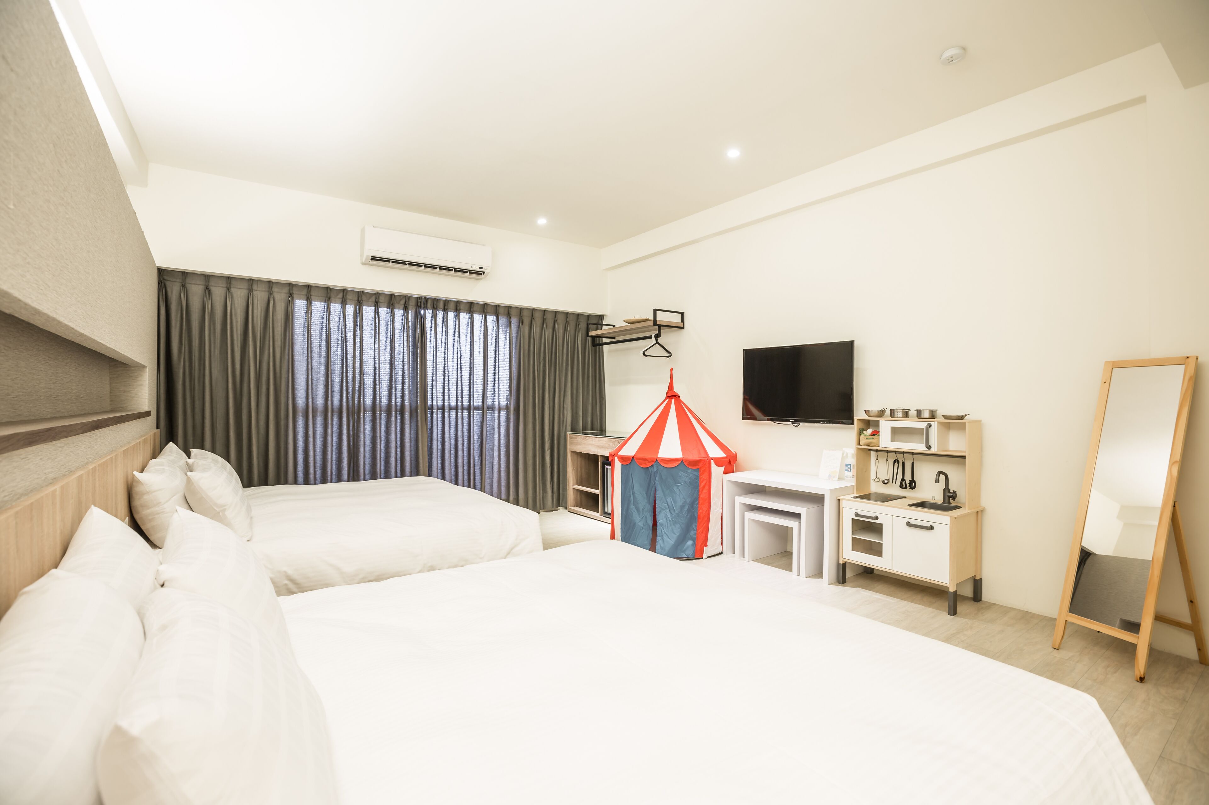 deluxe quadruple room | premium bedding, free minibar, desk, soundproofing