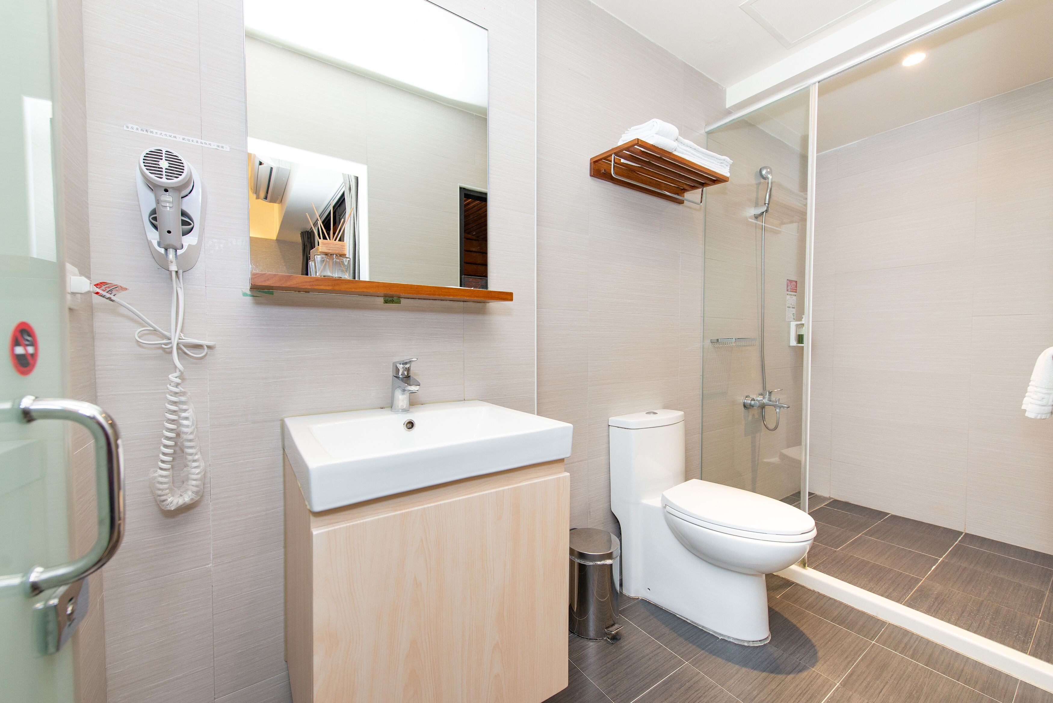 deluxe double room | bathroom | designer toiletries, hair dryer, slippers, bidet