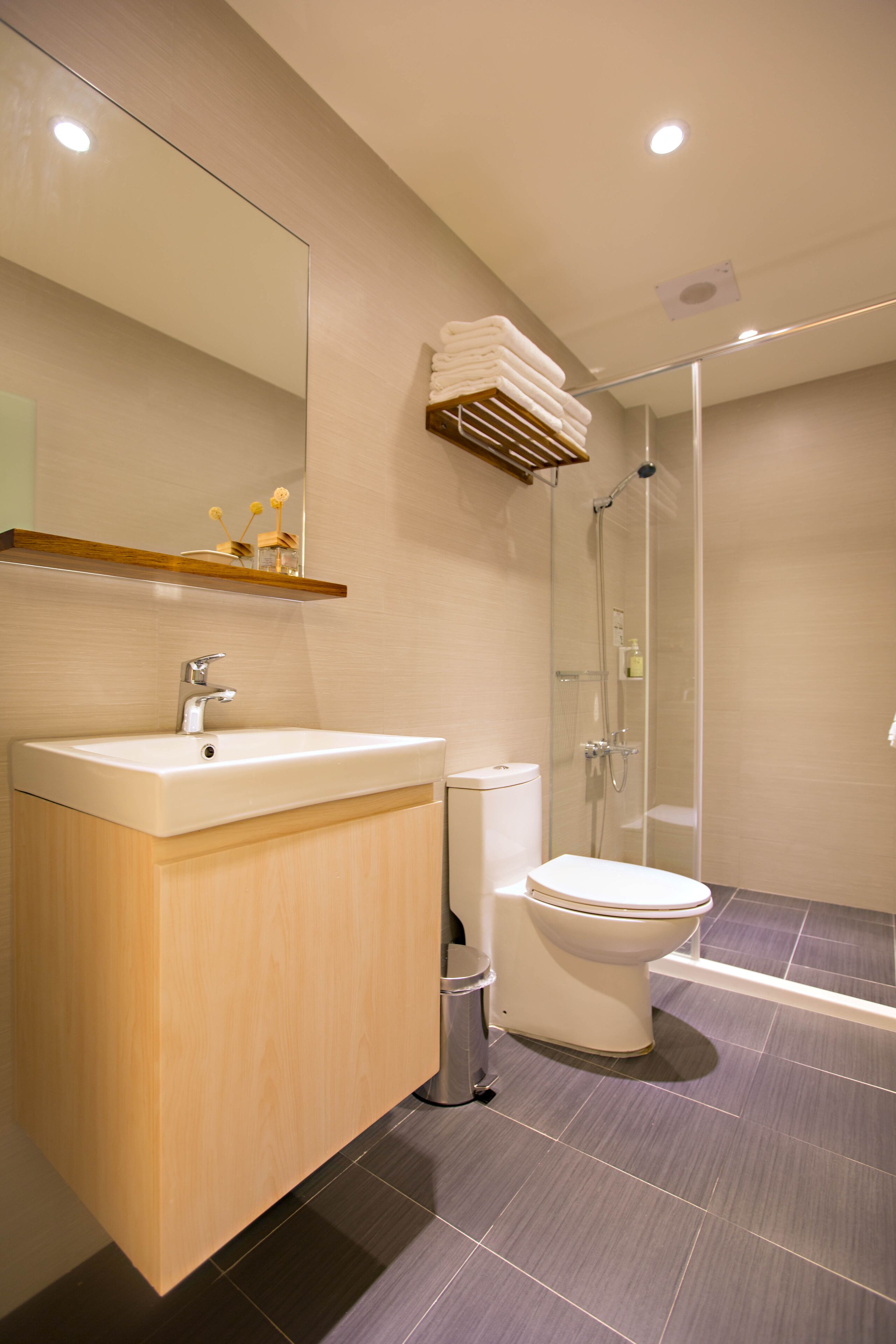 deluxe quadruple room | bathroom | designer toiletries, hair dryer, slippers, bidet
