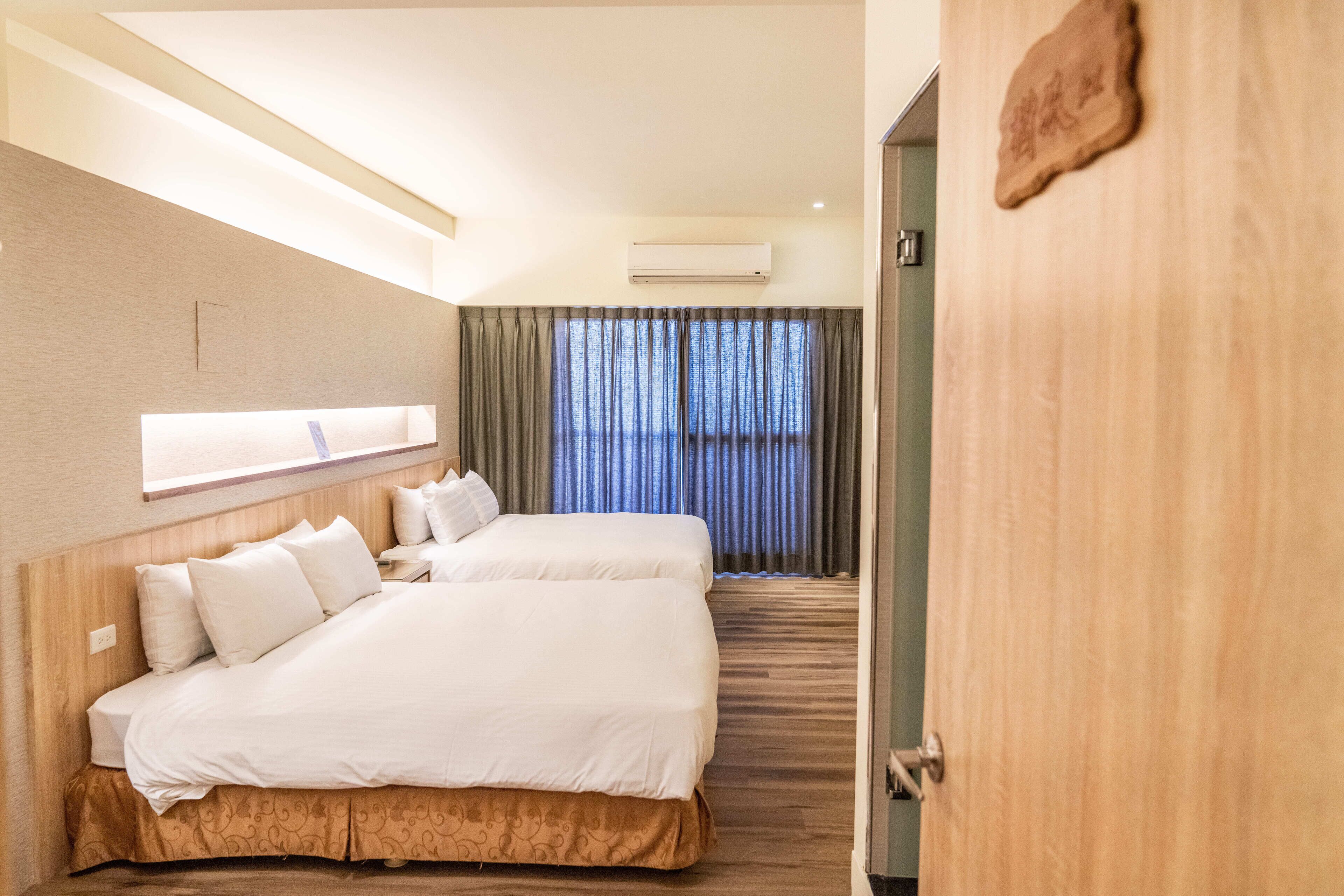 deluxe quadruple room | premium bedding, free minibar, desk, soundproofing