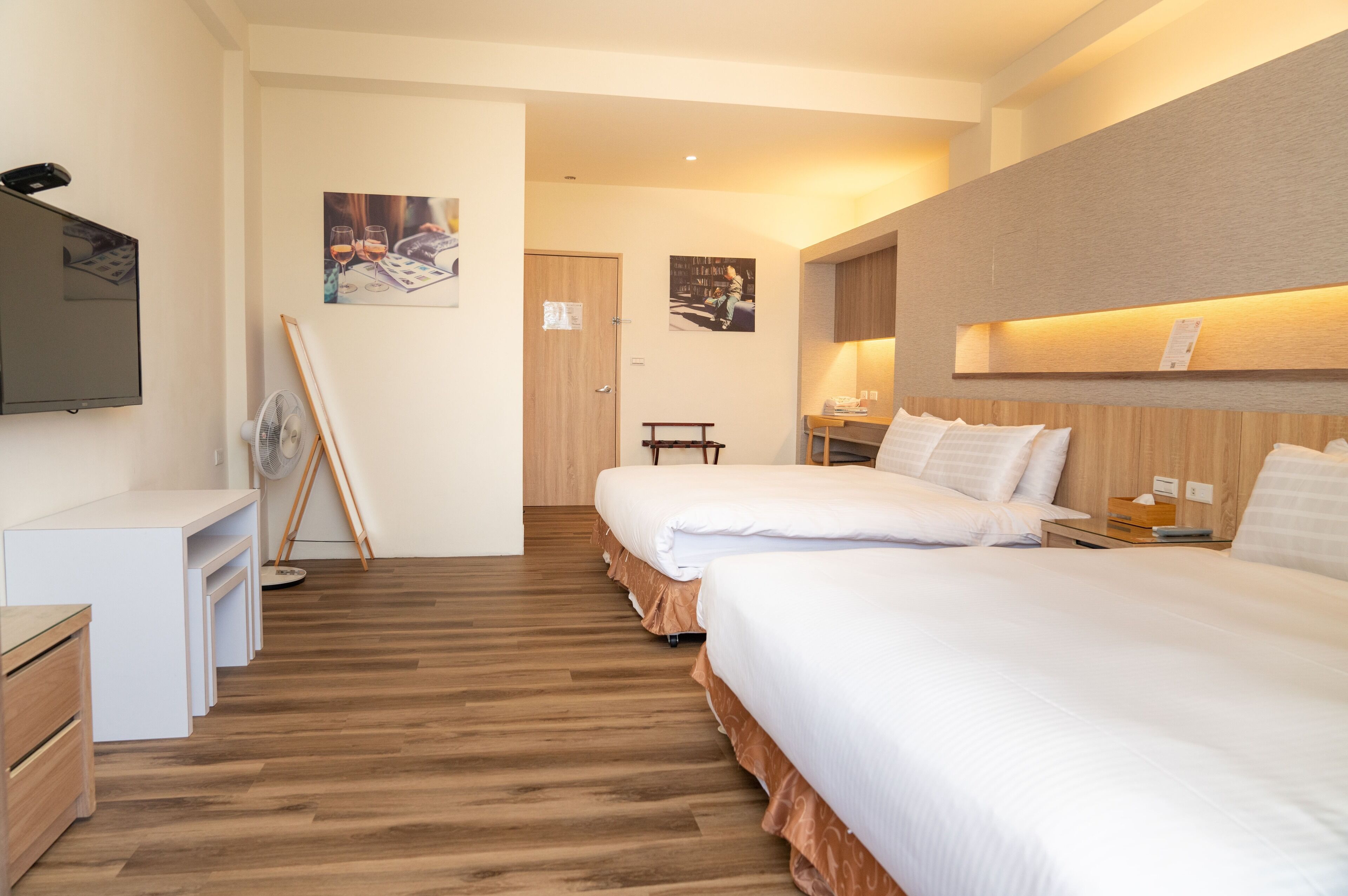 deluxe quadruple room | premium bedding, free minibar, desk, soundproofing
