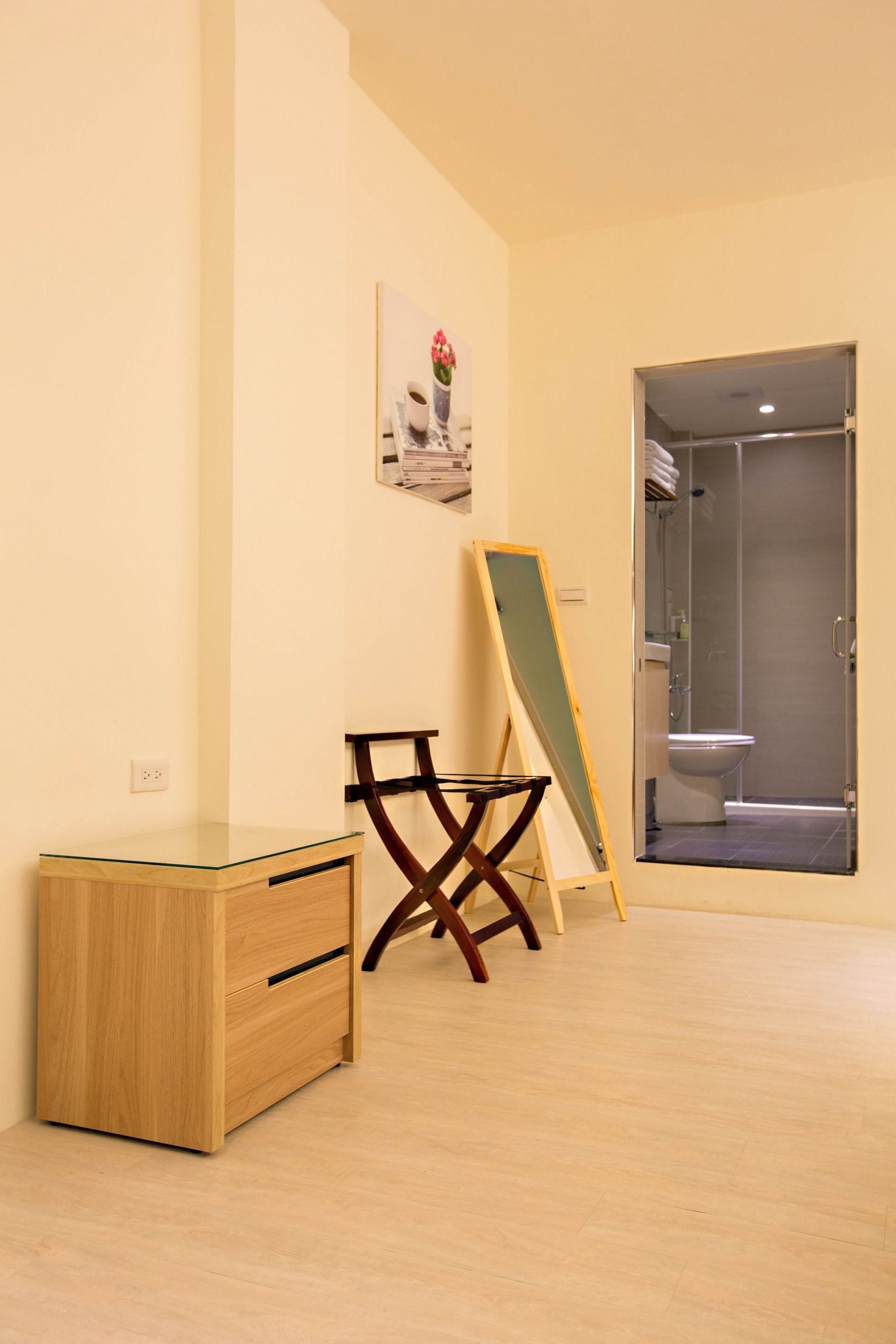 designer toiletries, hair dryer, slippers, bidet