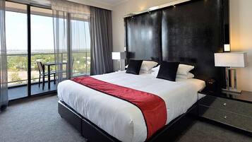 Executive Business Suite with Balcony | 1 bedroom, premium bedding, down comforters, memory foam beds