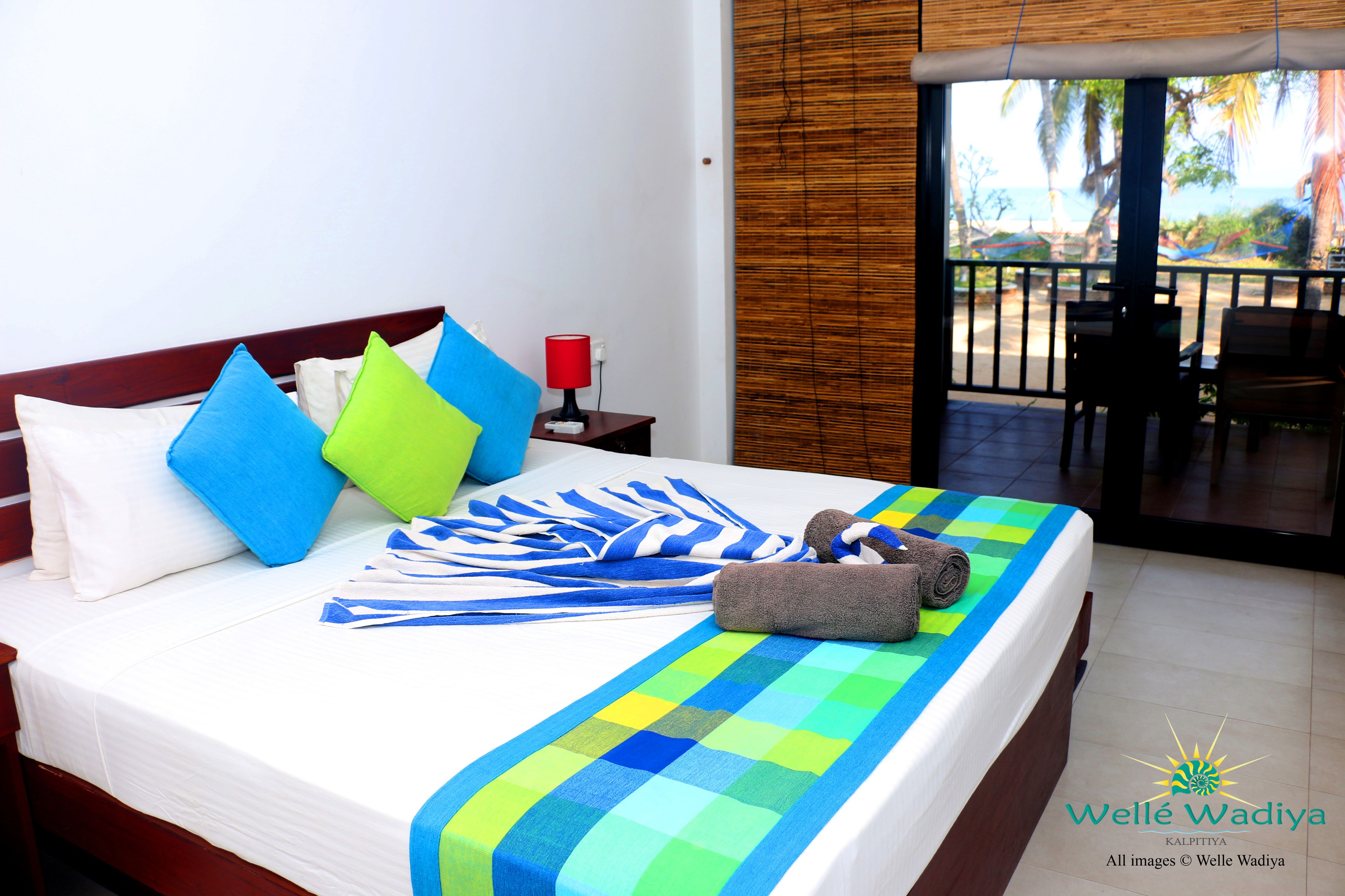 deluxe double room, 1 king bed, ocean view | premium bedding, in-room safe, desk, free wifi