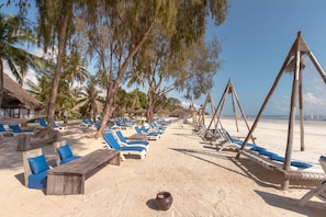 Private beach, white sand, sun-loungers, beach umbrellas