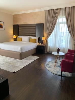 Premium bedding, in-room safe, desk, laptop workspace - The Sojourner by Genesis (Lagos)