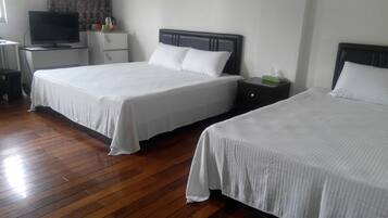 Standard Quadruple Room | Desk, laptop workspace, blackout curtains, rollaway beds