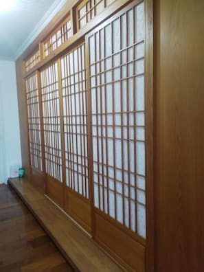 Traditional Japanese sliding door with a minimalist aesthetic.