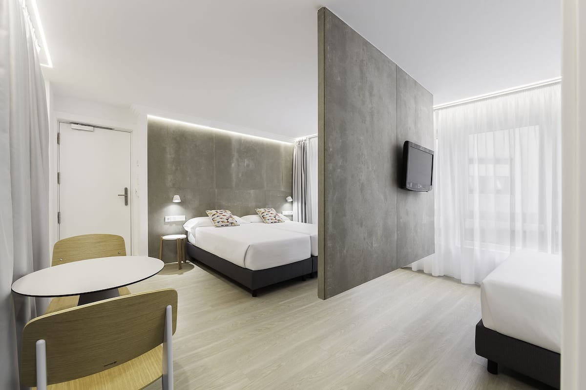 family room | desk, blackout curtains, soundproofing, iron/ironing board