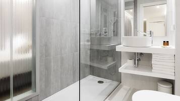 Habitación familiar | Baño | Artículos de higiene personal gratuitos, secador de pelo y toallas