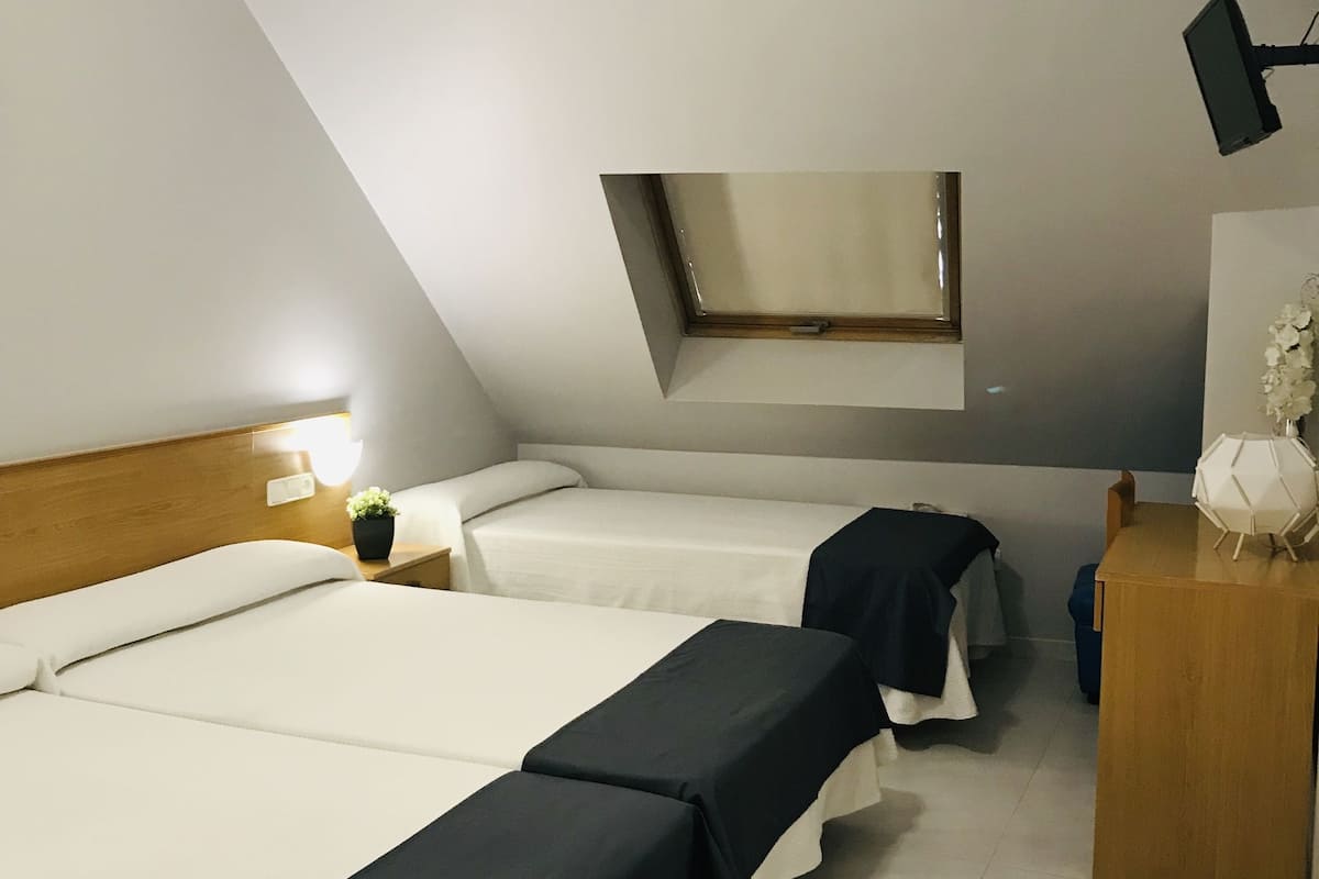 desk, blackout curtains, free cots/infant beds