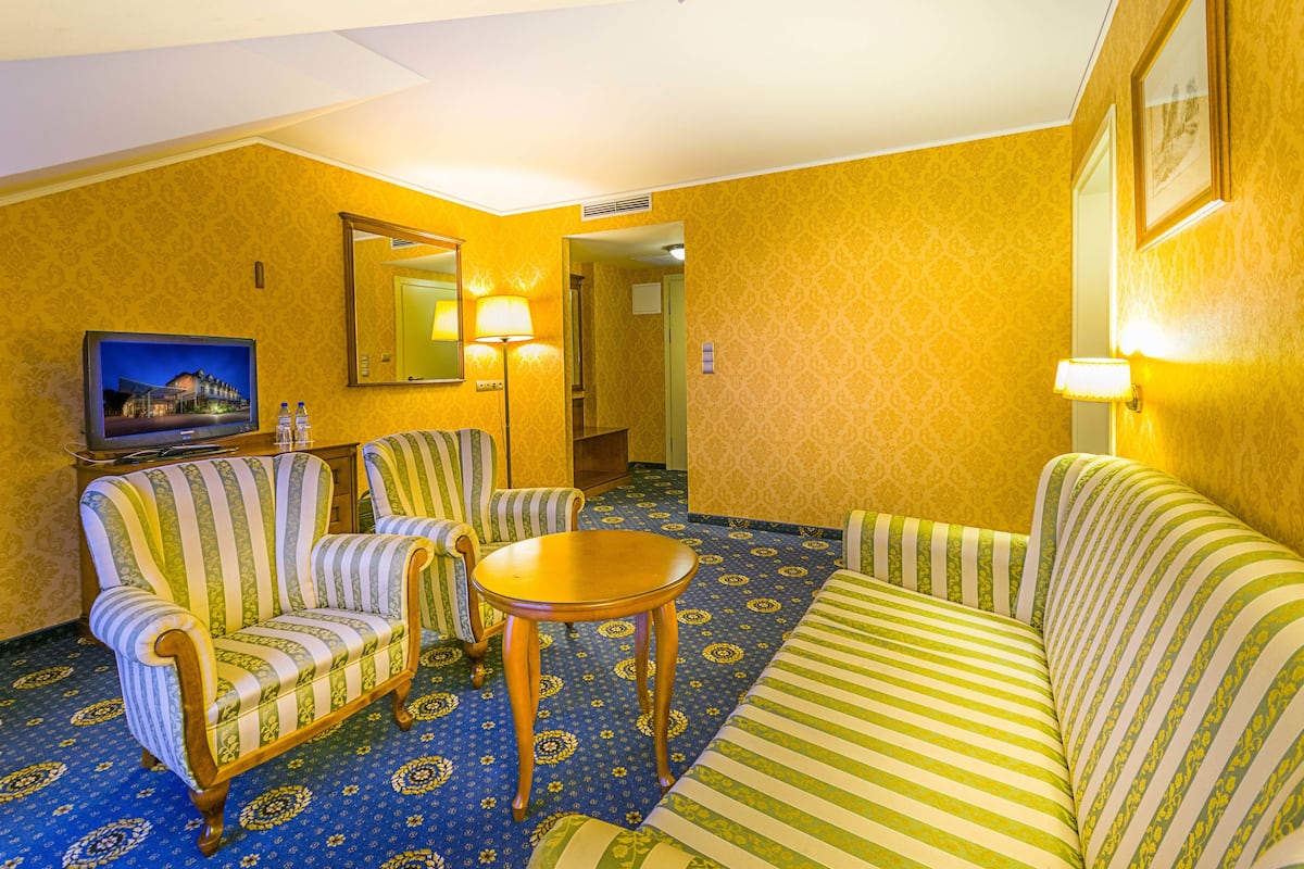 Traditional Apartment, 1 Bedroom | Living area | Flat-screen TV, table football, toys, books