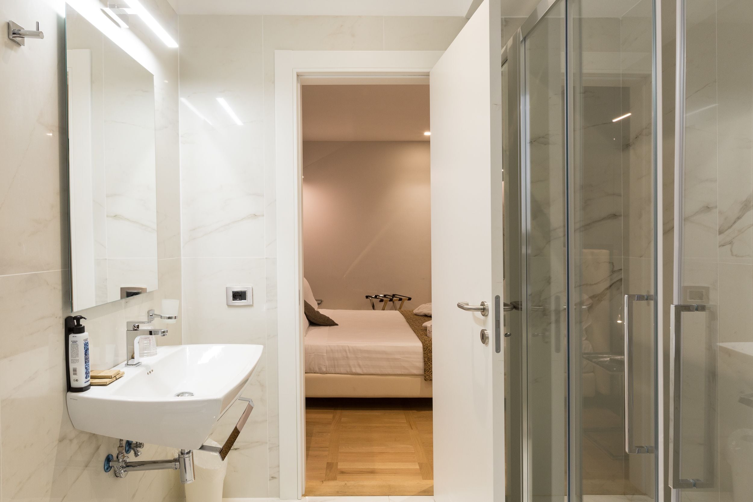 junior suite | bathroom | shower, rainfall showerhead, free toiletries, hair dryer
